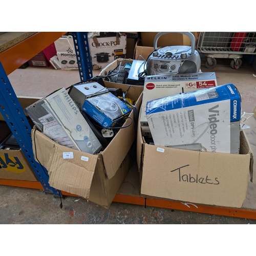 734 - Three boxes containing electrical items to include boxed Philips portable CD player, boxed Connax vi... 