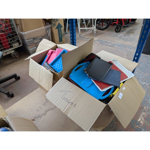 735 - Two boxes containing tablet cases and tablets for spares or repair