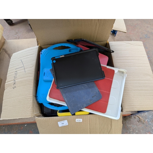 735 - Two boxes containing tablet cases and tablets for spares or repair