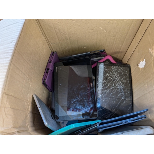 735 - Two boxes containing tablet cases and tablets for spares or repair