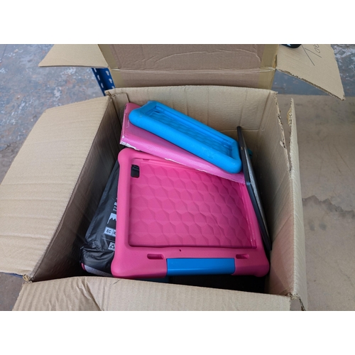 735 - Two boxes containing tablet cases and tablets for spares or repair