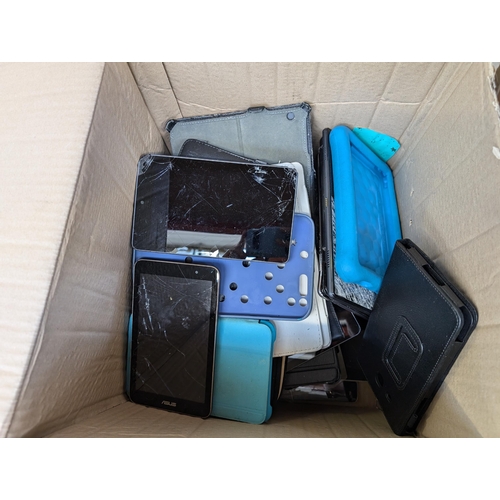 735 - Two boxes containing tablet cases and tablets for spares or repair