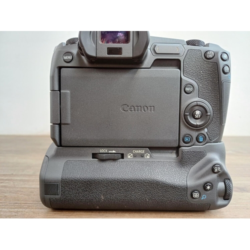 589 - A boxed Canon EOS R mirrorless 30.3mp full-frame digital camera body fitted with Canon BG-E22 batter... 