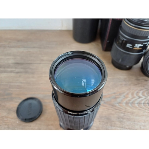 596 - Five Sigma camera lenses to include cased 70-300mm 1:4-5.6 APO macro, Sigma 75-300mm 1:4.5-5.6AF-APO... 