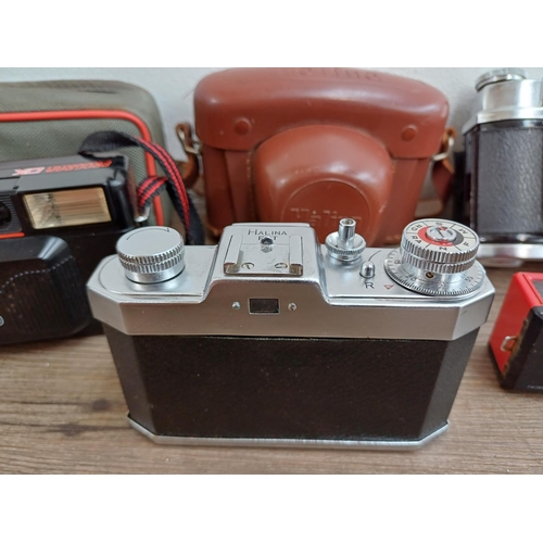 599 - Six Haking Halina cameras to include cased Pet 35mm viewfinder, 6-4 for 120 film, AF810 autofocus 35... 