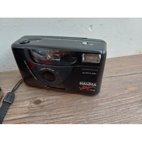 599 - Six Haking Halina cameras to include cased Pet 35mm viewfinder, 6-4 for 120 film, AF810 autofocus 35... 