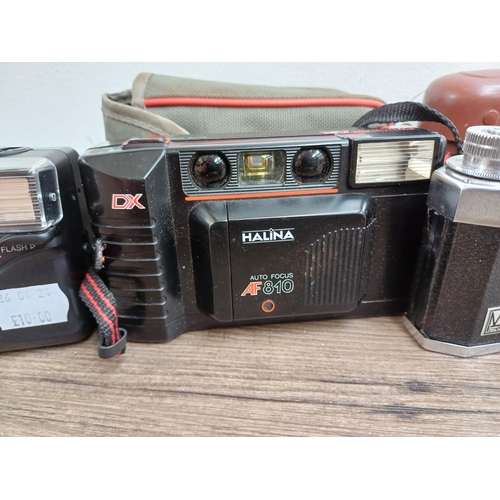 599 - Six Haking Halina cameras to include cased Pet 35mm viewfinder, 6-4 for 120 film, AF810 autofocus 35... 