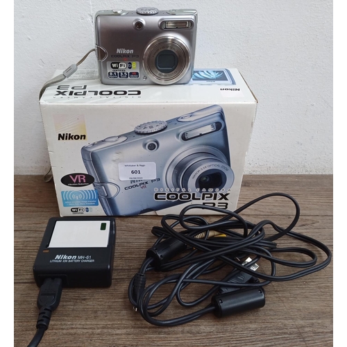 601 - A boxed Nikon Coolpix P3 8.1mp compact digital camera with charger and cables