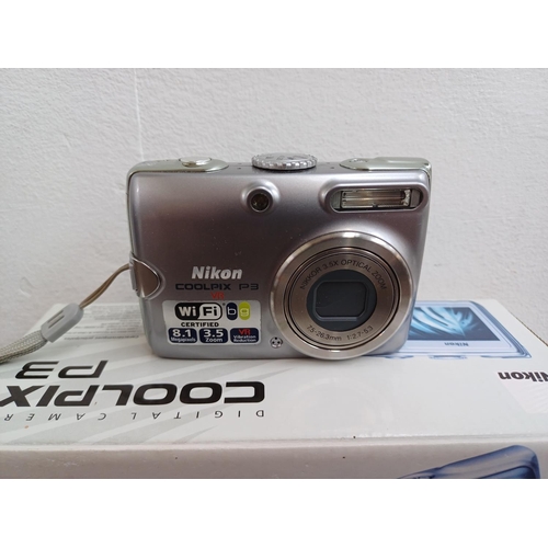 601 - A boxed Nikon Coolpix P3 8.1mp compact digital camera with charger and cables