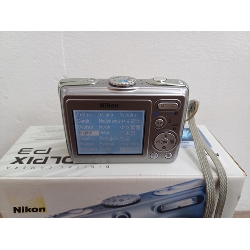 601 - A boxed Nikon Coolpix P3 8.1mp compact digital camera with charger and cables