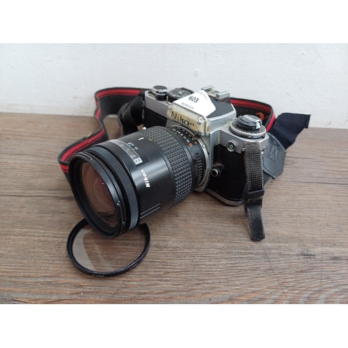 603 - A Nikon FE 35mm SLR camera fitted with Nikkor 28-85mm 1:3.5-4.5 lens