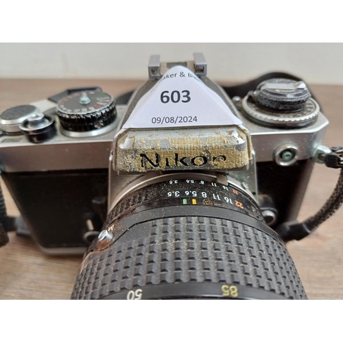 603 - A Nikon FE 35mm SLR camera fitted with Nikkor 28-85mm 1:3.5-4.5 lens