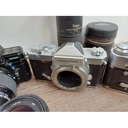 609 - A collection of lenses and cameras to include Minolta 7000 Maxxum 35mm SLR, Ihagee Exa II body, Niko... 