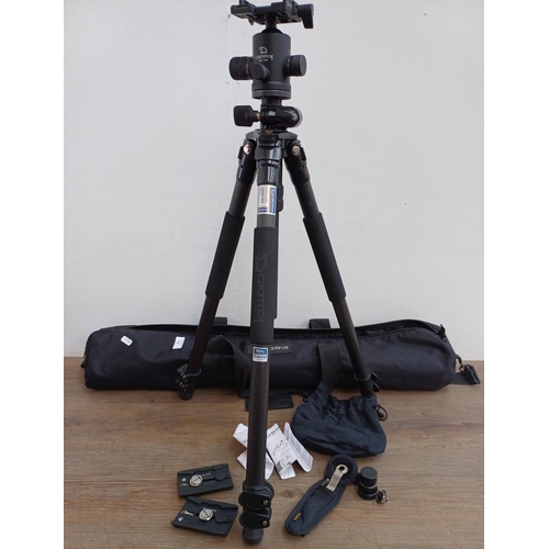 611 - A cased Giottos MTL 8361B professional carbon fiber tripod fitted with MH 1300-652 ball-head with fr... 