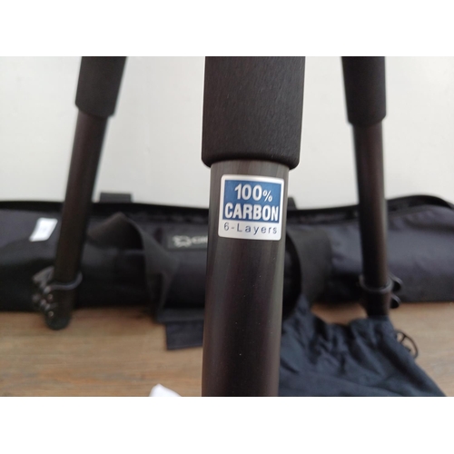 611 - A cased Giottos MTL 8361B professional carbon fiber tripod fitted with MH 1300-652 ball-head with fr... 