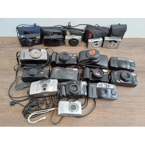 613 - A collection of Canon compact cameras to include AF35ML, Sure Shot AF-7, Sure Shot Zoom, IXUS 970 IS... 