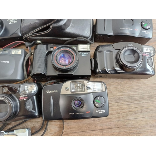 613 - A collection of Canon compact cameras to include AF35ML, Sure Shot AF-7, Sure Shot Zoom, IXUS 970 IS... 