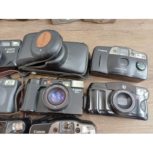 613 - A collection of Canon compact cameras to include AF35ML, Sure Shot AF-7, Sure Shot Zoom, IXUS 970 IS... 