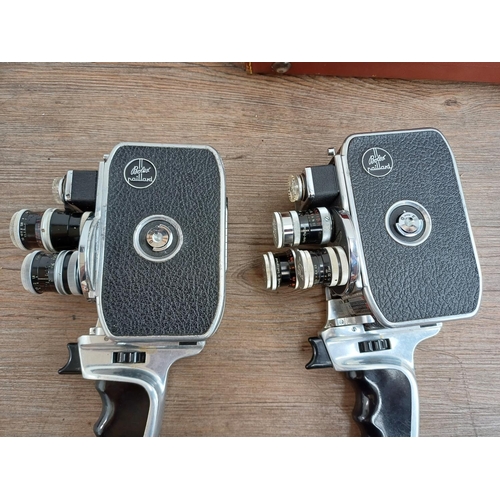 616 - Two Paillard Bolex D-8L rotatable turret, three lens 8mm cine cameras, one cased