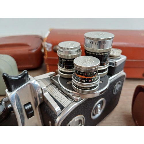 617 - Two cased 8mm cine cameras, one Paillard Bolex D-8L rotatable turret, three lens and one Carl Zeiss ... 