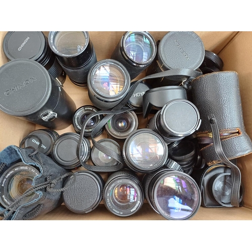 618 - A collection of camera lenses to include Chinon, Olympus Zuiko Digital, Olympus Zuiko OM-System, Min... 