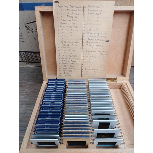 620 - Two boxes containing boxed and catalogued slides to include  'Scotland', 'London, Devon, Cornwall', ... 