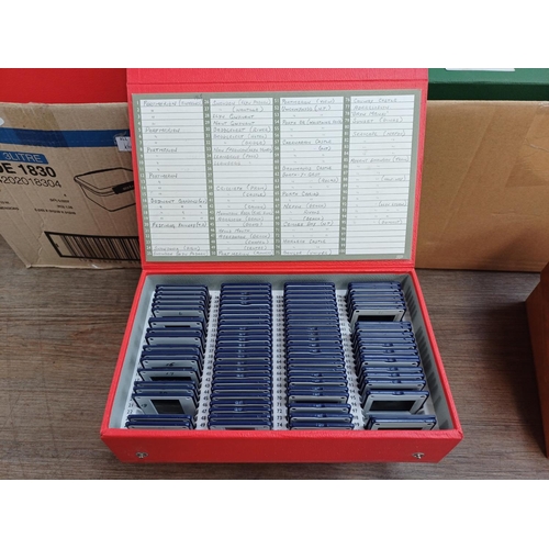 620 - Two boxes containing boxed and catalogued slides to include  'Scotland', 'London, Devon, Cornwall', ... 