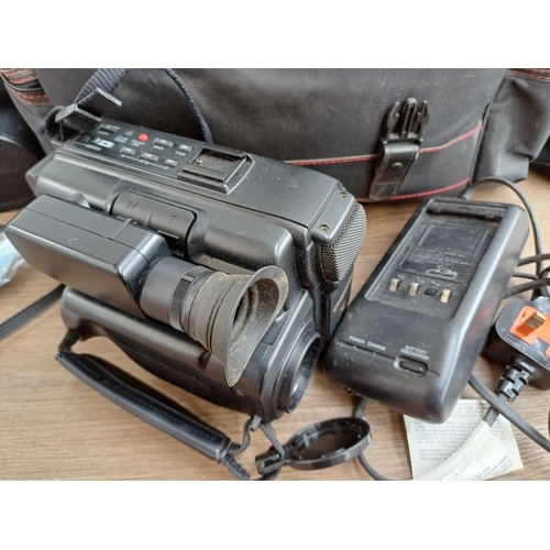 627 - Four items, one cased Chinon VC-1700 VHS-C camcorder with charger, one cased pair of Hanoptik 12x50 ... 