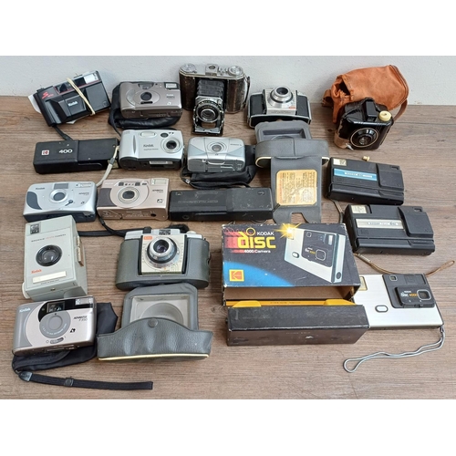 628 - A collection of Kodak cameras to include Colorsnap 35, Bantam Colorsnap, Duo 620 folding, boxed Disc... 