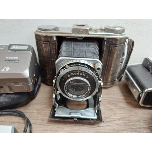 628 - A collection of Kodak cameras to include Colorsnap 35, Bantam Colorsnap, Duo 620 folding, boxed Disc... 