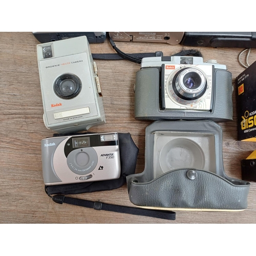 628 - A collection of Kodak cameras to include Colorsnap 35, Bantam Colorsnap, Duo 620 folding, boxed Disc... 