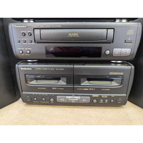 680 - A Technics surround sound hi-fi system comprising ST-CA1080 tuner, SE-CA1080 amplifier, SL-CA1060 CD... 