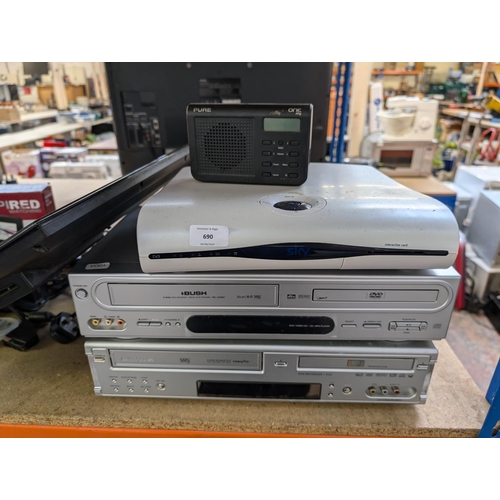 690 - A collection of AV items to include Bush and Daewoo VCR/DVD players, Blaupunkt 23.6