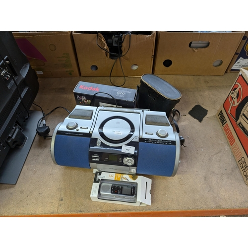 692 - Four items, one Goodmans GPS300 portable CD/radio/cassette player, one boxed Sony ICD-BX140 digital ... 