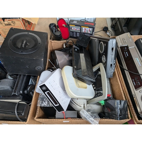 694 - A large collection of AV items to include portable DVD players, Samsung and Panasonic VCRs, Panasoni... 