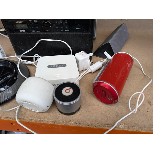 696 - A collection of audio equipment to include Sonos Bridge Beats and JBL speakers, Bush DAB radio, Coom... 