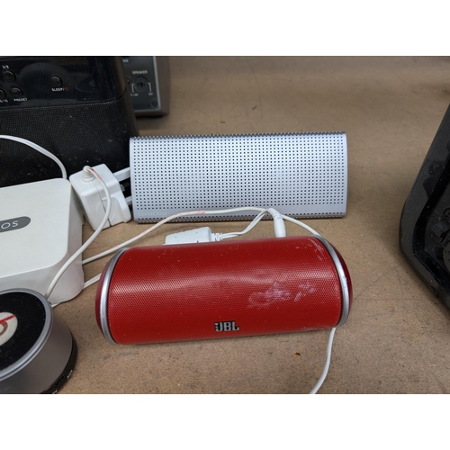 696 - A collection of audio equipment to include Sonos Bridge Beats and JBL speakers, Bush DAB radio, Coom... 