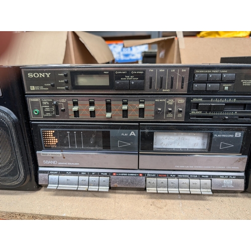 699 - A late 1980s Sony CFS-W500L portable four-band radio/twin cassette with detachable speakers