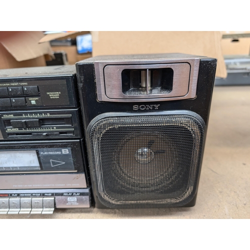 699 - A late 1980s Sony CFS-W500L portable four-band radio/twin cassette with detachable speakers