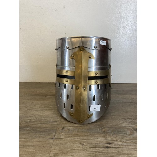 510 - A reproduction Medieval Templar Knight Crusader style brass and steel helmet - approx. 28cm high