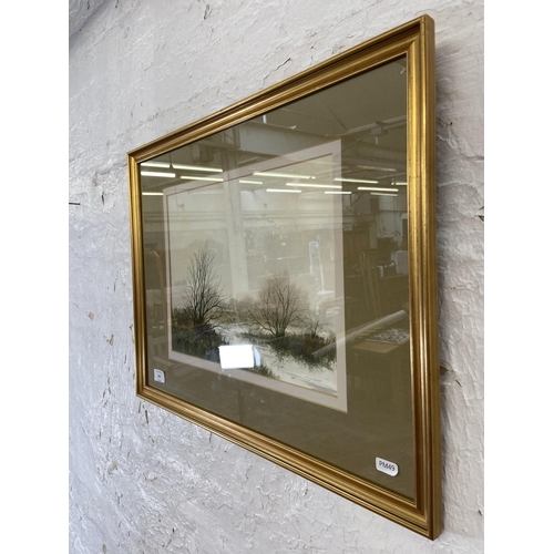 268 - A late 20th century gilt framed Paul Mann watercolour of a lakeside scene - approx. 47cm high x 60cm... 