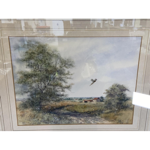 269 - A 20th century gilt framed watercolour of a farm scene signed lower right - approx. 45cm high x 52cm... 