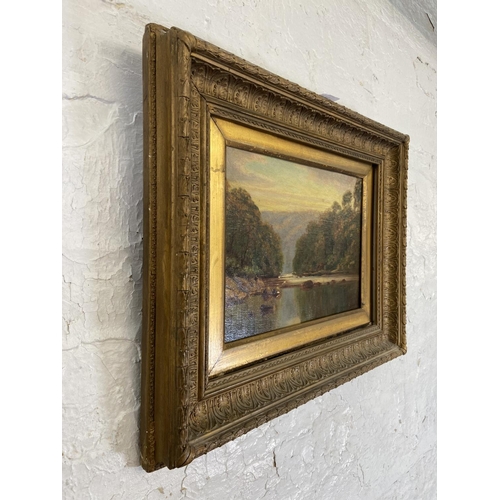 275 - A late 19th/early 20th century gilt framed T. Marshall Furness oil on board of a river scene - appro... 