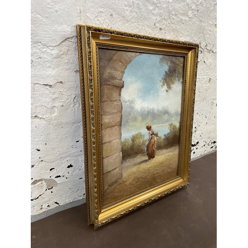 277 - A late 20th century gilt framed acrylic on canvas of a European figure by a lake signed lower left -... 