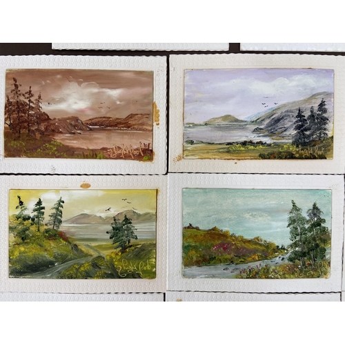 281 - A photograph album containing a collection of vintage acrylic on board paintings of landscape scenes... 