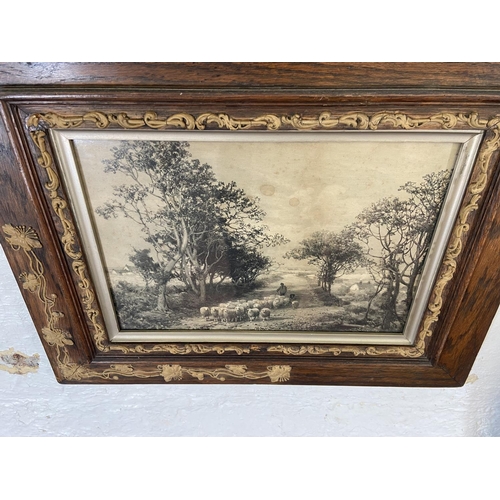 283 - A pair of 19th century prints of farming scenes in Art Nouveau oak and gilt frames - approx. 49cm hi... 