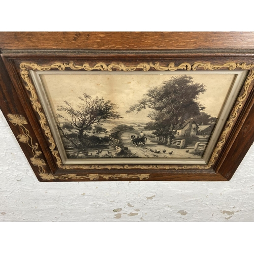 283 - A pair of 19th century prints of farming scenes in Art Nouveau oak and gilt frames - approx. 49cm hi... 