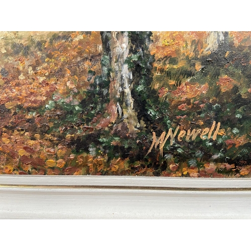 284 - A mid 20th century framed acrylic on board of a woodland scene titled 'Autumn Sunlight' signed lower... 