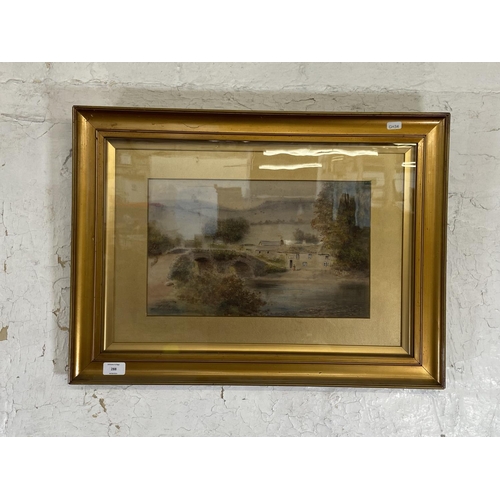 288 - A late 19th/early 20th century gilt framed J. W. Stedman watercolour of a village scene signed lower... 