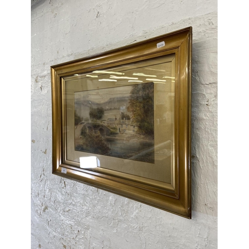 288 - A late 19th/early 20th century gilt framed J. W. Stedman watercolour of a village scene signed lower... 